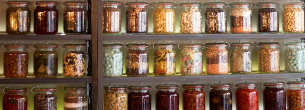 Glass jars with different kinds of pickles