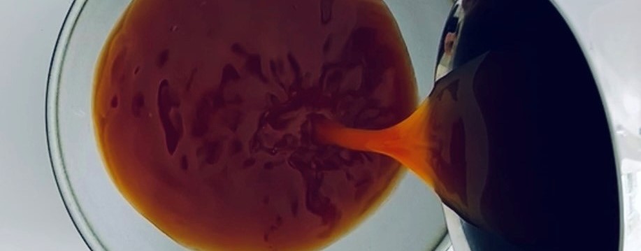 Brown liquid poured in bowl